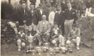 View: p2243 Group photograph, Grosvenor Rowing Club with trophies