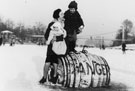 View: p2705 People walking on the frozen river Dee, during the winter of 1962-63