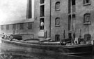 View: p2812 Canal boat loading at Griffiths Mill and Eastgate Street with horse-drawn trams on same negative