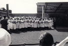 View: p3048 Black and White photograph of Nursing Staff outside the new Outpatients Department at Chester Royal Infirmary.